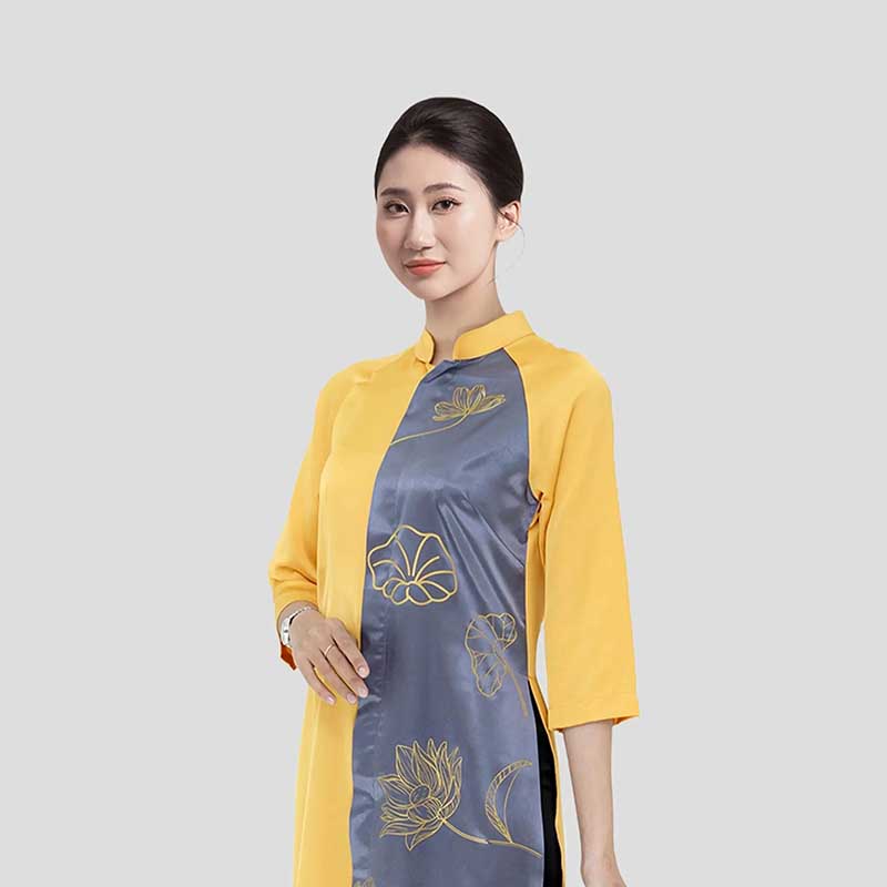 Áo dài được sử dụng làm đồng phục lễ tân phổ biến tại các nhà hàng hiện nay